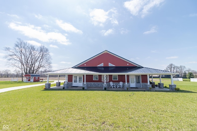 8267 W County Road 350 S, Shirley, IN 47384 - country-style home with an outdoor structure, metal roof, french doors, stone siding, and a front yard