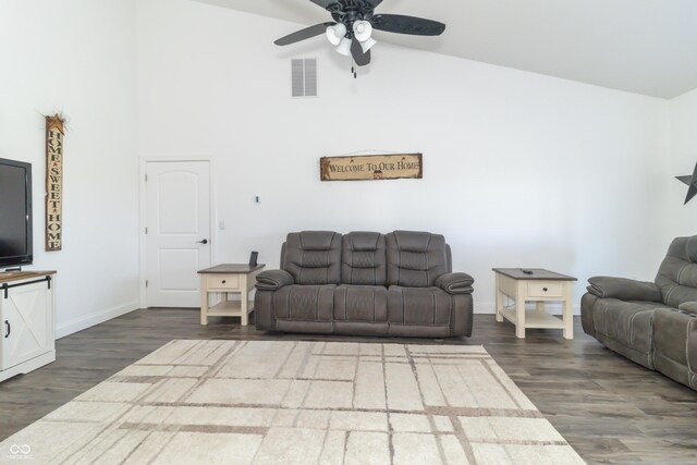 8267 W County Road 350 S, Shirley, IN 47384 - living room featuring high vaulted ceiling, a ceiling fan, wood finished floors, baseboards, and visible vents