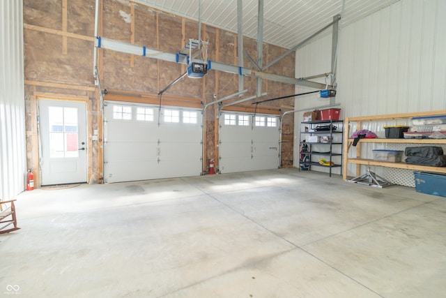 8267 W County Road 350 S, Shirley, IN 47384 - garage featuring metal wall and a garage door opener