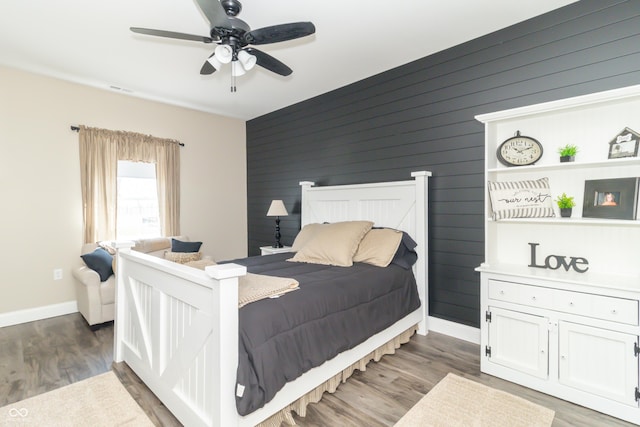 8267 W County Road 350 S, Shirley, IN 47384 - bedroom with a ceiling fan, baseboards, and wood finished floors