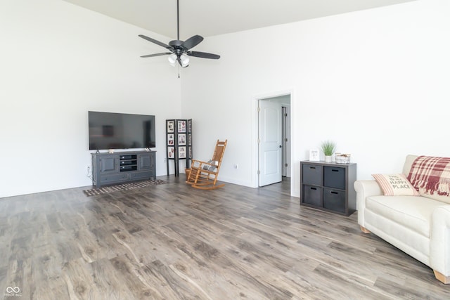 8267 W County Road 350 S, Shirley, IN 47384 - unfurnished living room featuring a high ceiling, ceiling fan, and wood finished floors