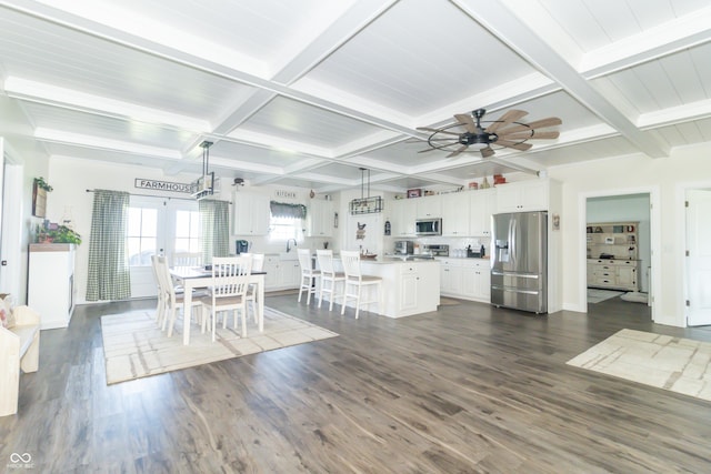 8267 W County Road 350 S, Shirley, IN 47384 - unfurnished dining area featuring a ceiling fan, dark wood-style floors, and beamed ceiling