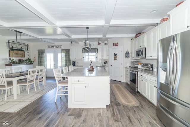 8267 W County Road 350 S, Shirley, IN 47384 - kitchen with dark wood finished floors, white cabinetry, beam ceiling, and appliances with stainless steel finishes
