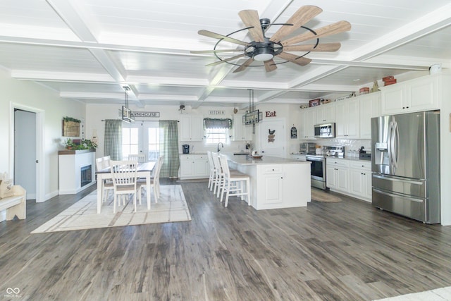 8267 W County Road 350 S, Shirley, IN 47384 - kitchen featuring dark wood-style floors, light countertops, white cabinets, and appliances with stainless steel finishes