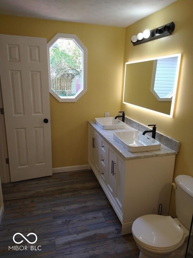 1447 Rebecca Ln, Franklin, IN 46131 - bathroom featuring wood finished floors and double vanity