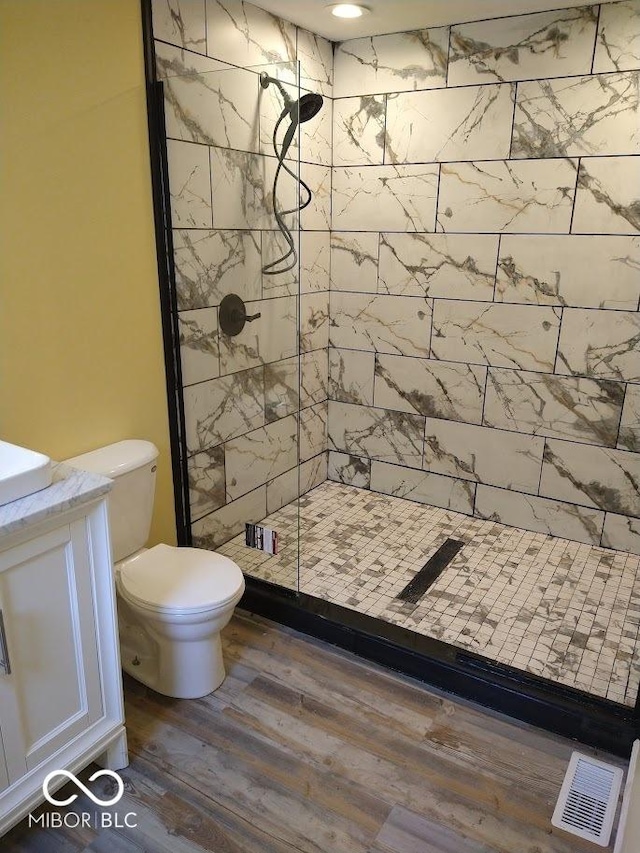 1447 Rebecca Ln, Franklin, IN 46131 - bathroom with a stall shower, wood finished floors, and vanity