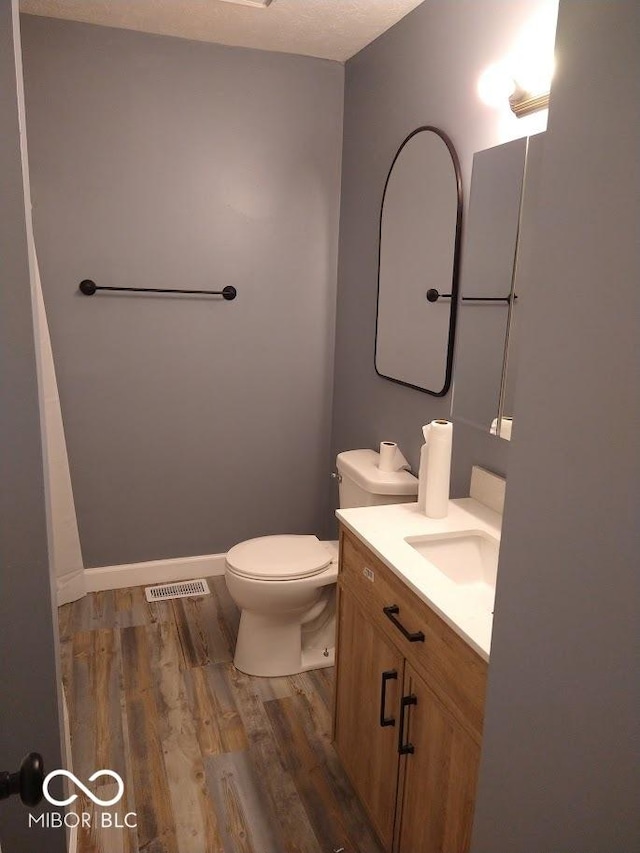 1447 Rebecca Ln, Franklin, IN 46131 - bathroom with vanity and wood finished floors
