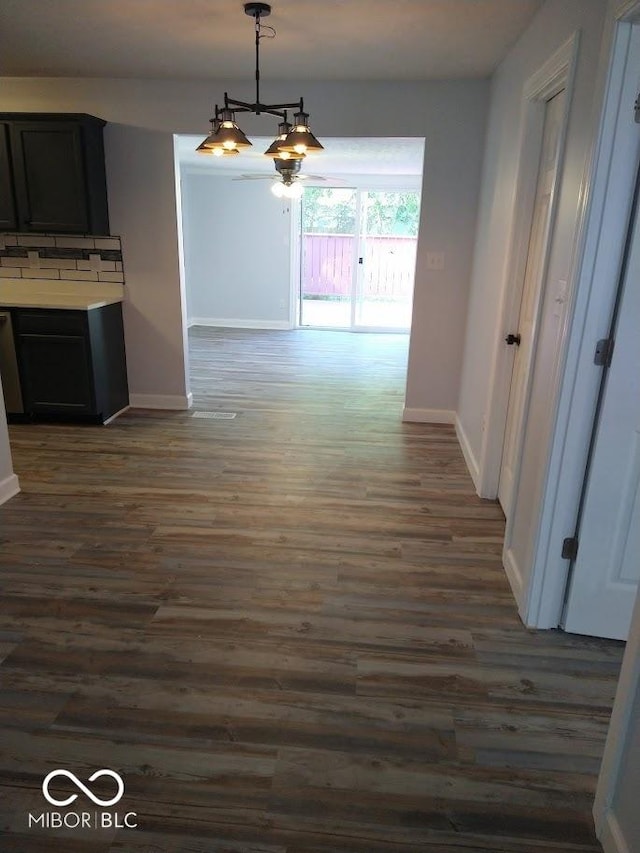 1447 Rebecca Ln, Franklin, IN 46131 - unfurnished dining area featuring dark wood-style flooring and a chandelier