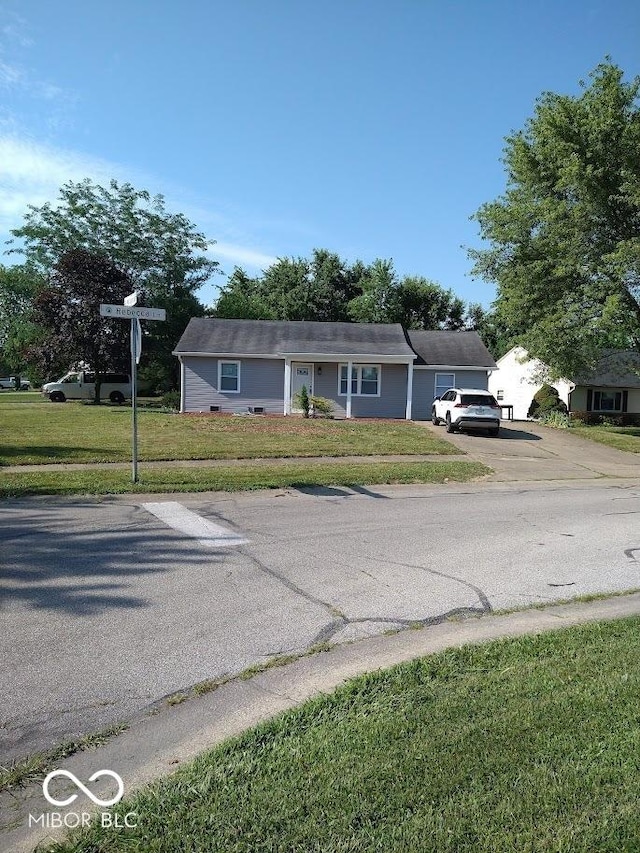 1447 Rebecca Ln, Franklin, IN 46131 - ranch-style house with asphalt driveway and a front lawn