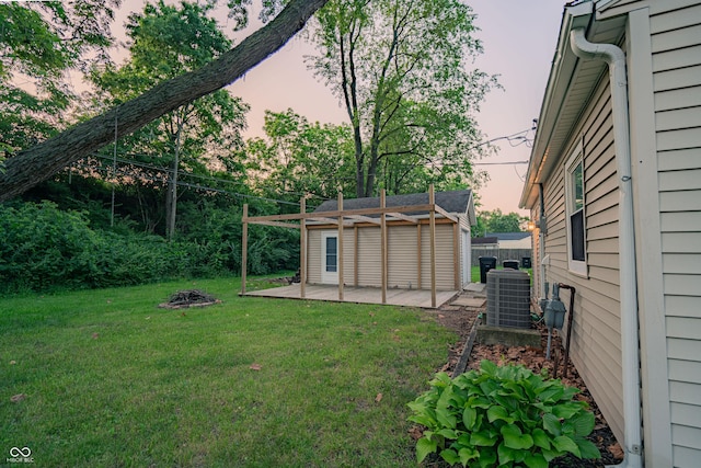 2612 Midlex Ct, Lafayette, IN 47904 - view of yard featuring an outbuilding and a patio area