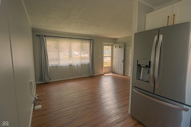 2612 Midlex Ct, Lafayette, IN 47904 - kitchen featuring stainless steel refrigerator with ice dispenser, a textured ceiling, wood finished floors, white cabinetry, and crown molding