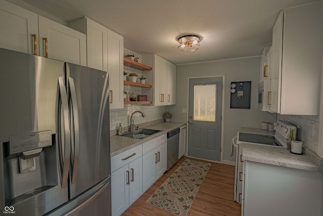 2612 Midlex Ct, Lafayette, IN 47904 - kitchen featuring stainless steel appliances, open shelves, light countertops, and decorative backsplash