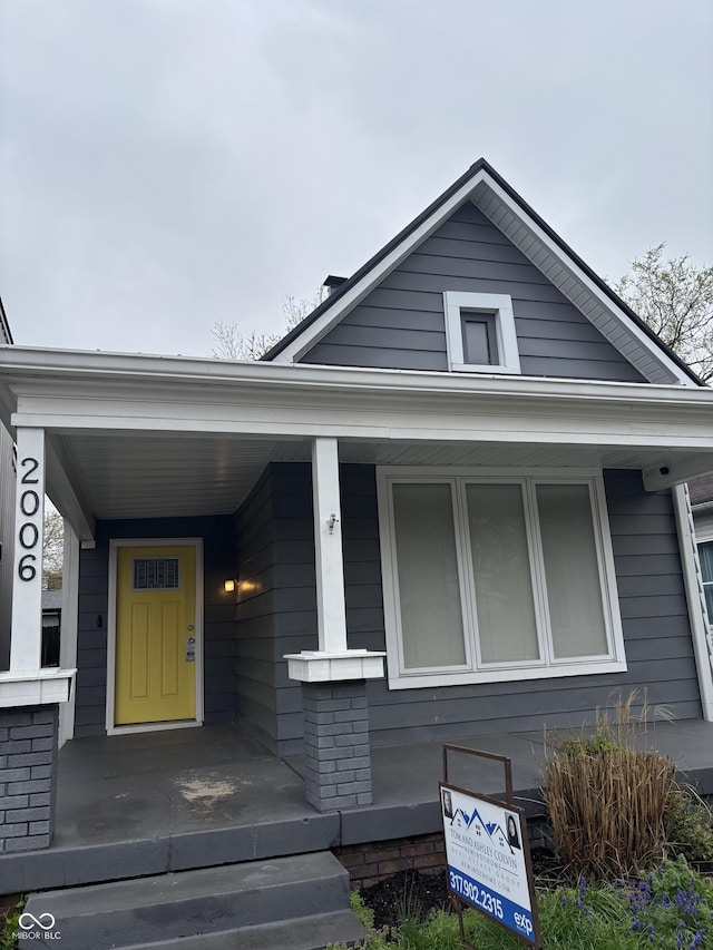 2006 Lexington Ave, Indianapolis, IN 46203 - view of front facade featuring covered porch