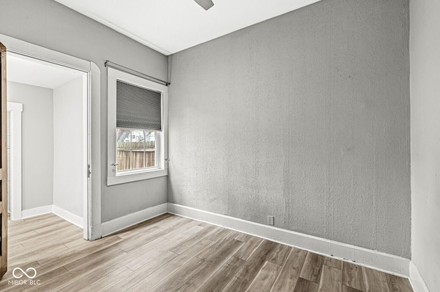 2006 Lexington Ave, Indianapolis, IN 46203 - empty room featuring baseboards and wood finished floors