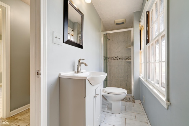 6047 W 56th St, Indianapolis, IN 46254 - bathroom with baseboards, toilet, a stall shower, and vanity