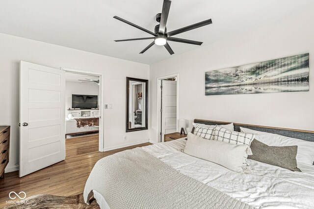 5028 Graceland Ave, Indianapolis, IN 46208 - bedroom with baseboards, ceiling fan, and wood finished floors