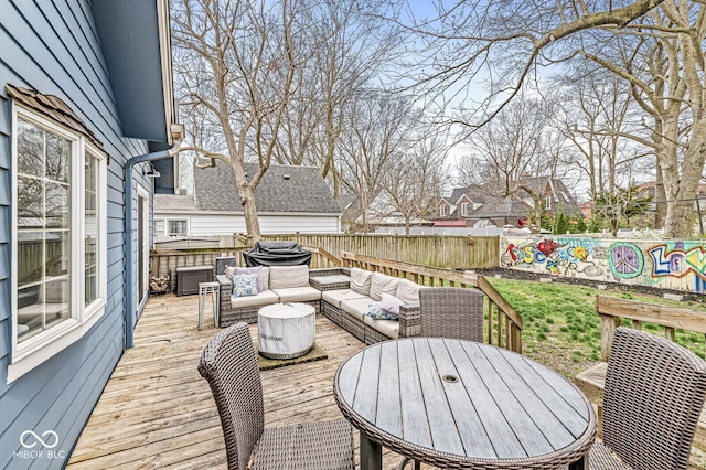 5028 Graceland Ave, Indianapolis, IN 46208 - wooden terrace with a fenced backyard and an outdoor hangout area