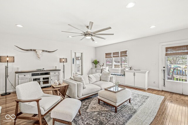 5028 Graceland Ave, Indianapolis, IN 46208 - living room featuring recessed lighting, light wood-style flooring, ceiling fan, and baseboards