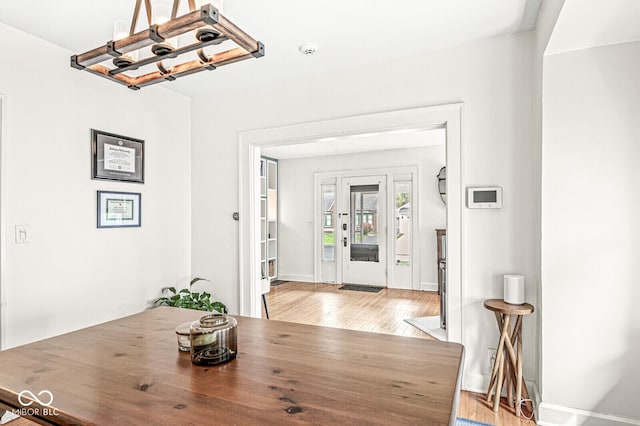 5028 Graceland Ave, Indianapolis, IN 46208 - dining room featuring baseboards and light wood-style floors