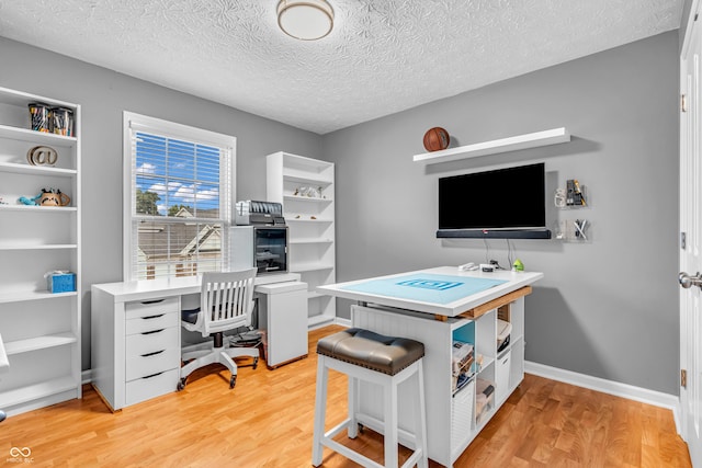 6071 Sugar Pine Dr, Avon, IN 46123 - office space with light wood-type flooring, a textured ceiling, and baseboards