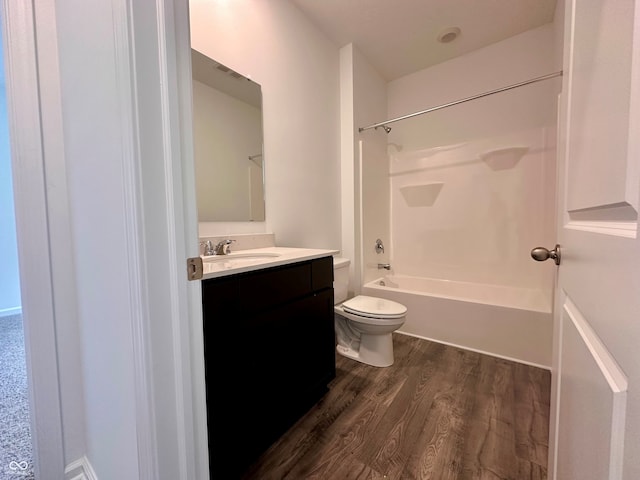 8727 Duncan St, Fortville, IN 46040 - full bath featuring wood finished floors, vanity, and shower / bath combination