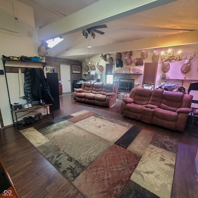 1024 Foltz St, Indianapolis, IN 46241 - living room with vaulted ceiling with beams, wood finished floors, and ceiling fan with notable chandelier