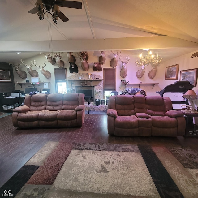 1024 Foltz St, Indianapolis, IN 46241 - living room featuring lofted ceiling with beams, wood finished floors, and ceiling fan with notable chandelier