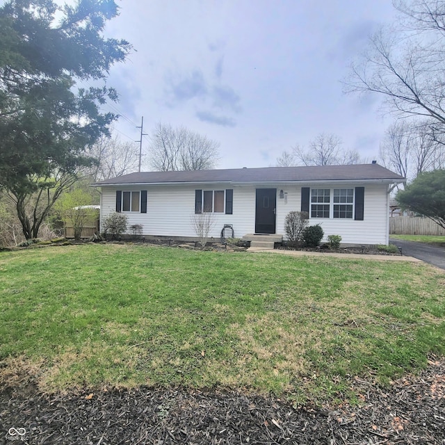 1024 Foltz St, Indianapolis, IN 46241 - ranch-style house with a front yard, fence, and entry steps