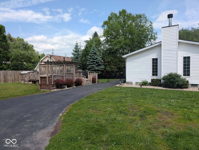 1024 Foltz St, Indianapolis, IN 46241 - view of front facade with a deck and a chimney