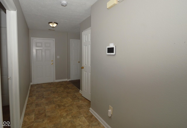 5406 Shamus Dr, Indianapolis, IN 46235 - hall with baseboards and stone finish floors