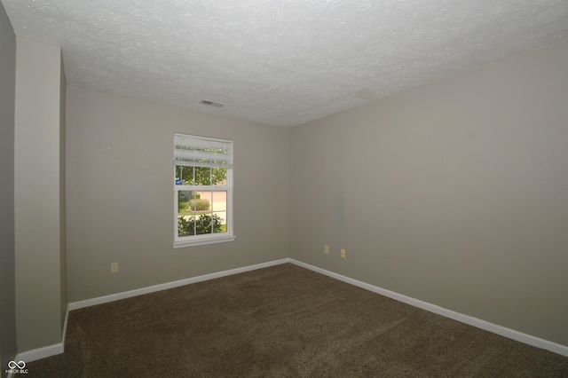 5406 Shamus Dr, Indianapolis, IN 46235 - spare room with a textured ceiling, carpet floors, and baseboards