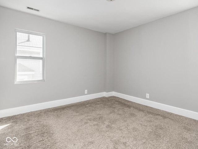 317 E 37th St, Indianapolis, IN 46205 - carpeted spare room with baseboards and visible vents