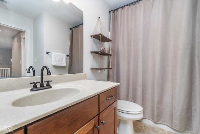 2353 Woodcreek Crossing Blvd, Avon, IN 46123 - bathroom with toilet, vanity, and tile patterned floors