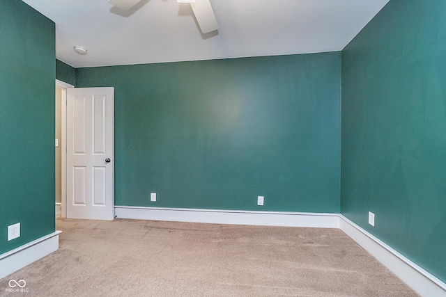 2353 Woodcreek Crossing Blvd, Avon, IN 46123 - carpeted spare room featuring a ceiling fan, a smoke detector, and baseboards