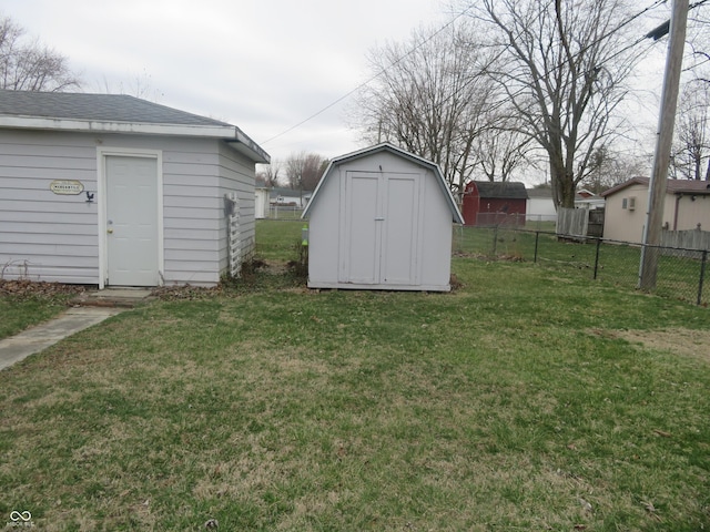 view of shed with fence