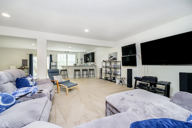 living area with carpet flooring and recessed lighting