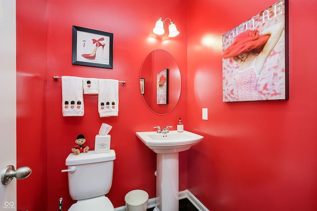 bathroom with a sink and toilet