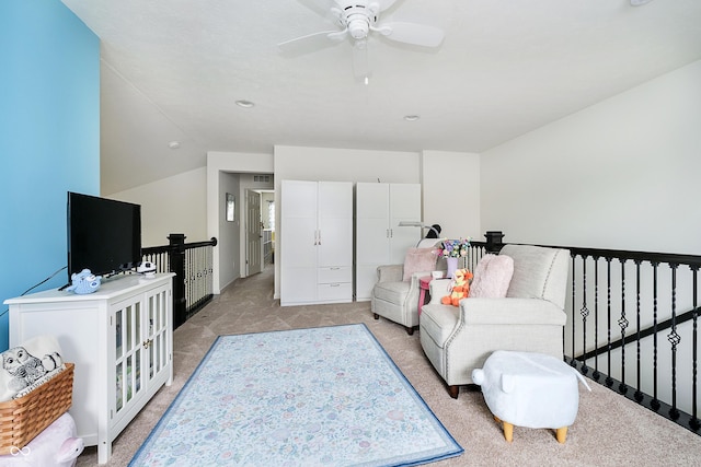 living room with recessed lighting, a ceiling fan, vaulted ceiling, and light carpet