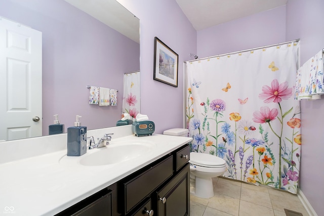 bathroom with vanity, tile patterned flooring, a shower with curtain, and toilet