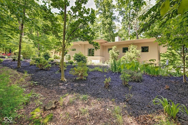 7493 E Rush Ridge Rd, Bloomington, IN 47401 - view of front facade with a chimney