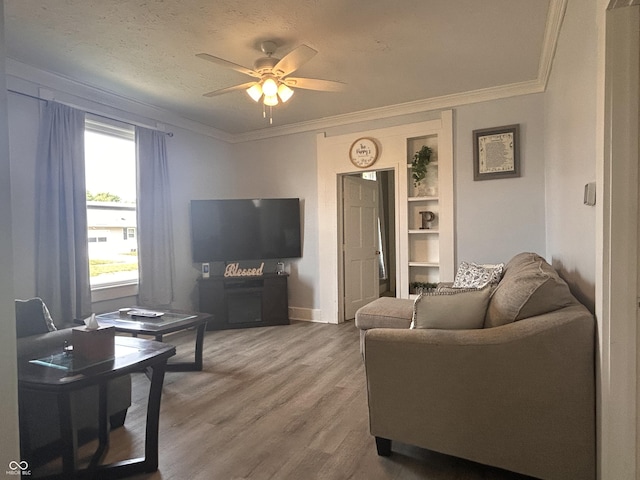 159 N Lincoln St, Martinsville, IN 46151 - living area with a ceiling fan, wood finished floors, ornamental molding, and baseboards