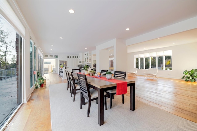 1227 S Pickwick Pt, Bloomington, IN 47401 - dining space with baseboards, light wood-type flooring, and recessed lighting