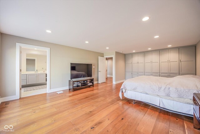 1227 S Pickwick Pt, Bloomington, IN 47401 - bedroom with baseboards, visible vents, recessed lighting, and light wood finished floors