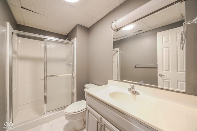 1227 S Pickwick Pt, Bloomington, IN 47401 - full bathroom with a stall shower, toilet, vanity, and a drop ceiling