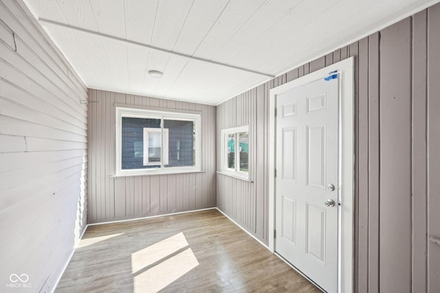 422 N Oxford St, Indianapolis, IN 46201 - foyer featuring wood finished floors, wood walls, and baseboards