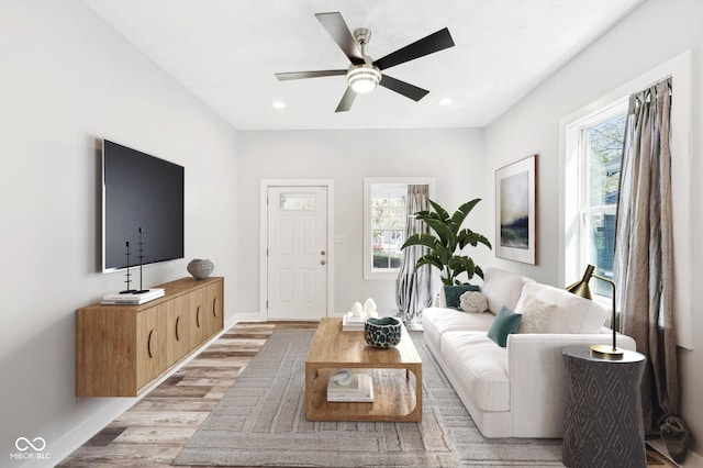 422 N Oxford St, Indianapolis, IN 46201 - living area with plenty of natural light, light wood-type flooring, recessed lighting, a ceiling fan, and baseboards
