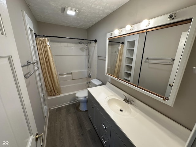 6672 E 225 S, Whitestown, IN 46075 - bathroom featuring shower / tub combo, vanity, a textured ceiling, toilet, and wood finished floors