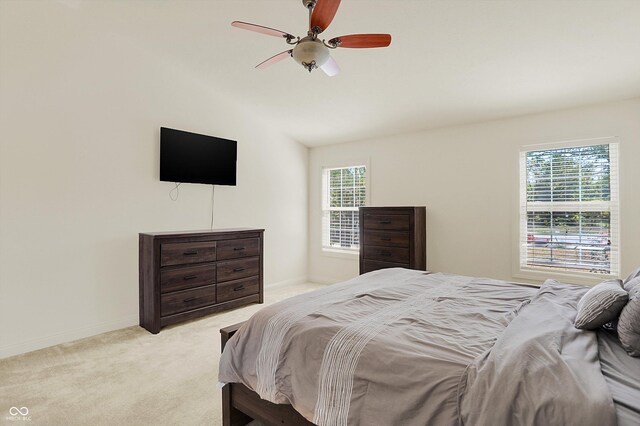 6869 W Winding, Mccordsville, IN 46055 - bedroom with ceiling fan, multiple windows, light carpet, and lofted ceiling