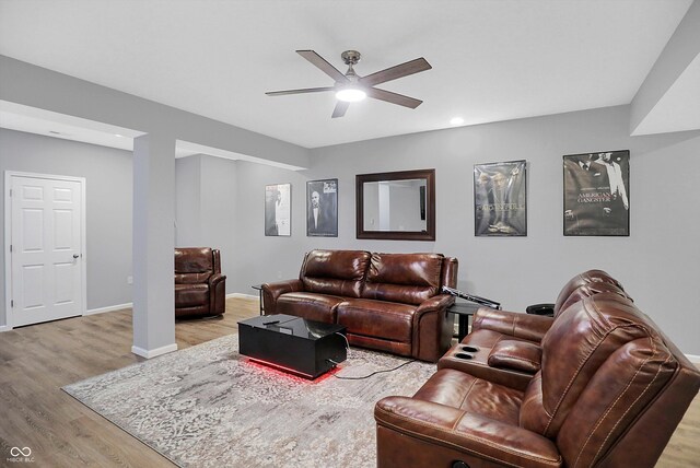 6869 W Winding, Mccordsville, IN 46055 - living room featuring ceiling fan, light wood-type flooring, and baseboards