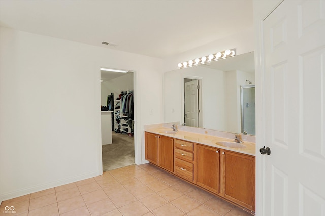 6869 W Winding, Mccordsville, IN 46055 - full bath featuring tile patterned flooring, double vanity, visible vents, and a sink